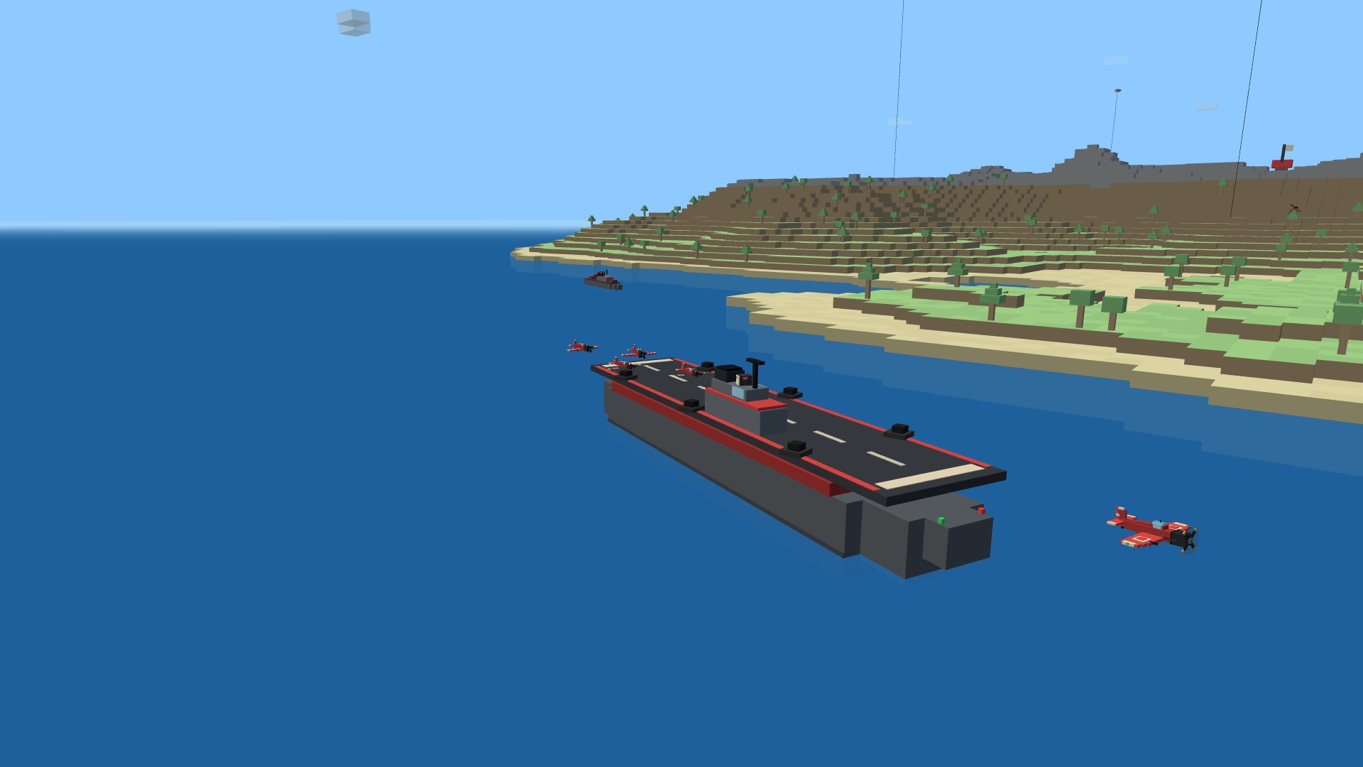 The carrier from the bow quarter with aircraft spotted on deck and one off the catapult