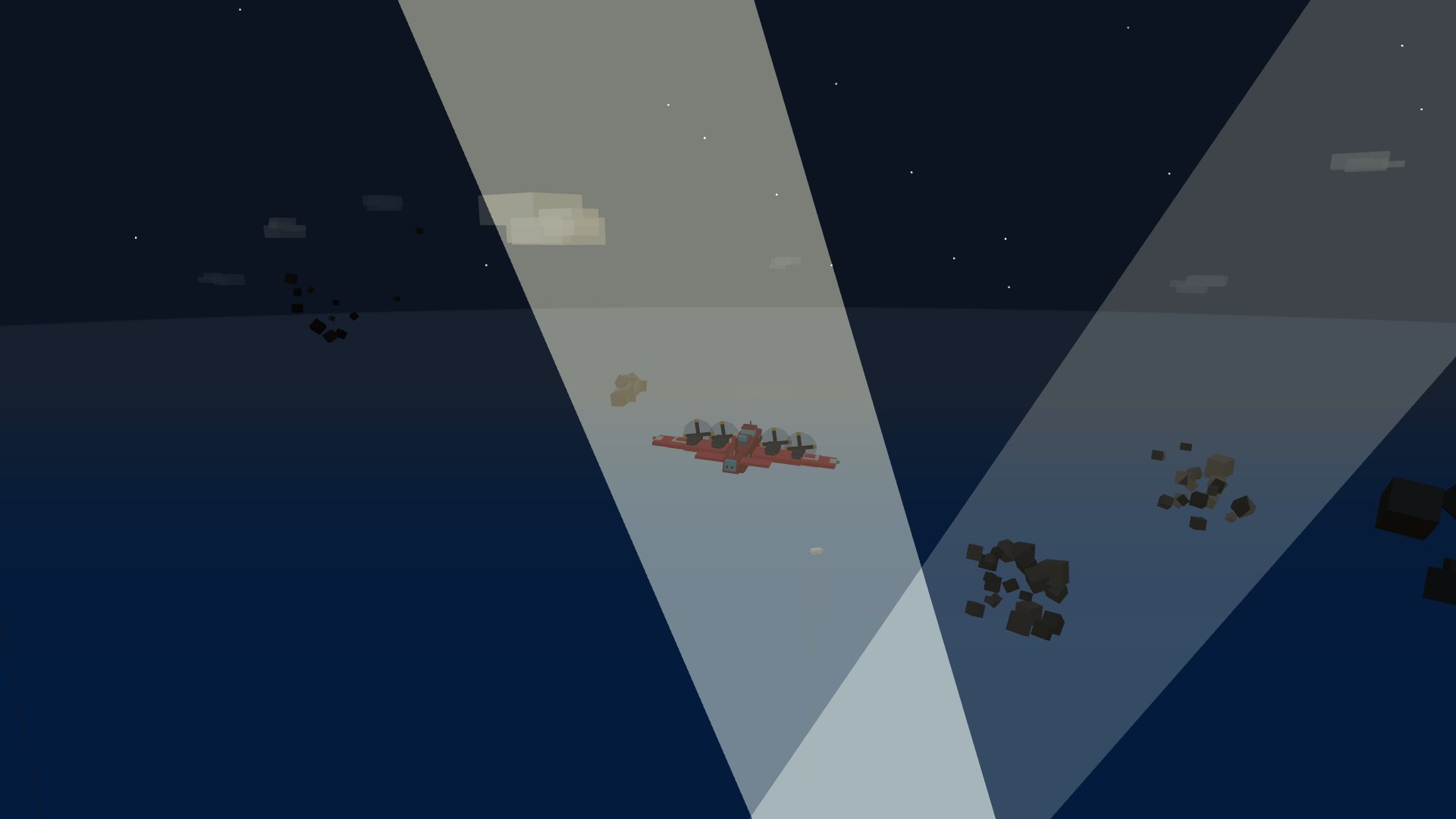 A Leviathan bomber caught in two searchlight beams at night with heavy flak rising
